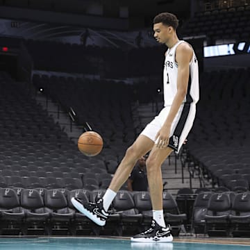 Jun 24, 2023; San Antonio, TX, USA; San Antonio Spurs draft pick Victor Wembanyama shoots around at a press conference at AT&T Center. 