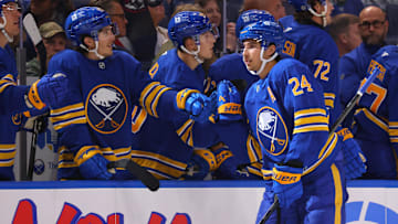 Sep 21, 2024; Buffalo, New York, USA;  Buffalo Sabres center Dylan Cozens (24) celebrates his goal with teammates during the third period against the Pittsburgh Penguins at KeyBank Center. Mandatory Credit: Timothy T. Ludwig-Imagn Images