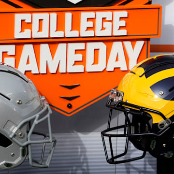 Nov. 25, 2023; Ann Arbor, Mi., USA;
Helmets for the Ohio State Buckeyes and the Michigan Wolverines decorate the on-field set for ESPN  s College GameDay before Saturday  s NCAA Division I football game at Michigan Stadium.
