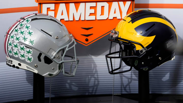 Nov. 25, 2023; Ann Arbor, Mi., USA;
Helmets for the Ohio State Buckeyes and the Michigan Wolverines decorate the on-field set for ESPN  s College GameDay before Saturday  s NCAA Division I football game at Michigan Stadium.