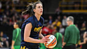 Indiana Fever guard Caitlin Clark warms up before the game against the Brazil National Team at Carver-Haweye Arena.