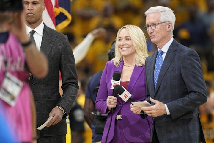 TV personalities Doris Burke and Mike Breen on the court before game three of the 2025 NBA Finals. 