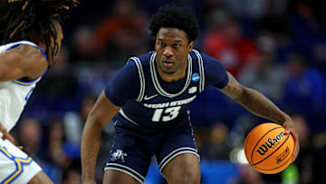 Utah State Aggies guard Deyton Albury (13). 