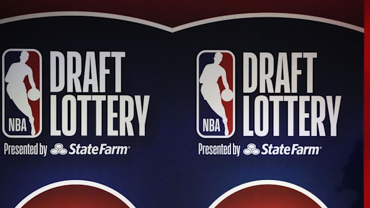 May 12, 2025; Chicago, Illinois, US; A person watches the 2025 NBA Draft Lottery at McCormick Place. Mandatory Credit: David Banks-Imagn Images
