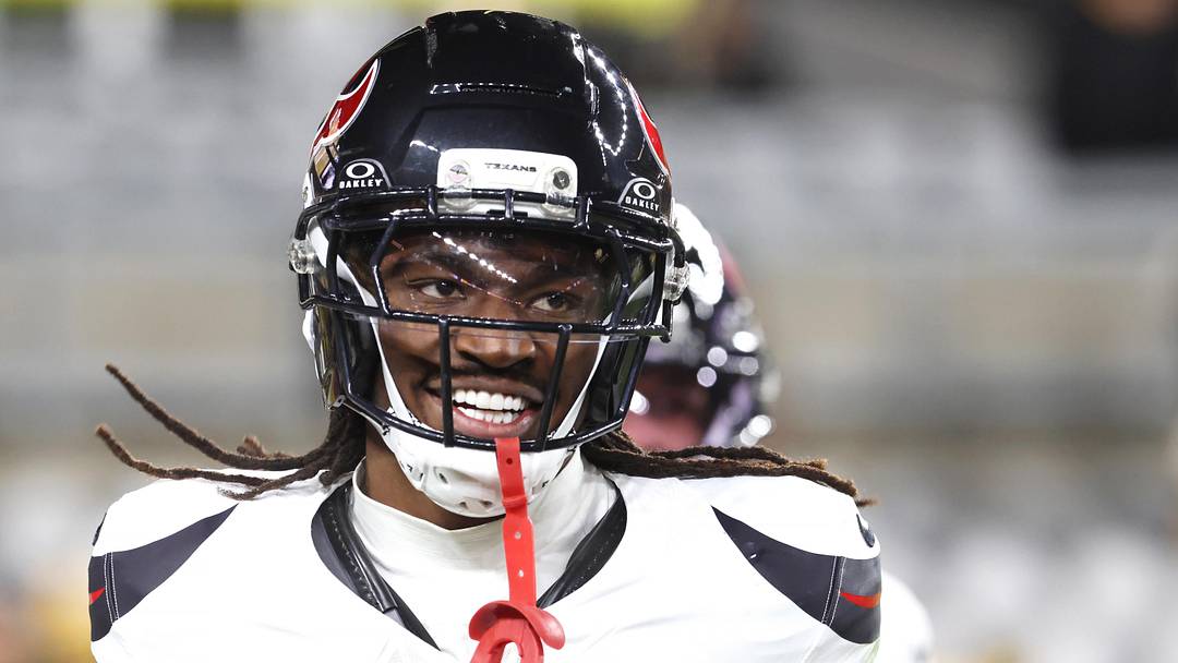 Jan 12, 2026; Pittsburgh, PA, USA; Houston Texans safety Calen Bullock (2) reacts after scoring a touchdown on an interception return during the second half of an AFC Wild Card Round game against the Pittsburgh Steelers at Acrisure Stadium. Mandatory Credit: Charles LeClaire-Imagn Images