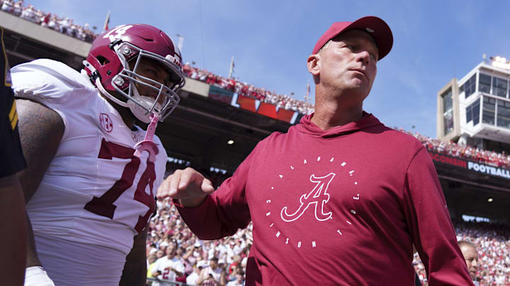 Sep 14, 2024; Madison, Wisconsin, USA;  Alabama Crimson Tide head coach Kalen DeBoer greets offensive lineman Kadyn Proctor (74) prior to the game against the Wisconsin Badgers at Camp Randall Stadium. 