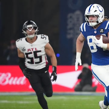 Indianapolis Colts tight end Tyler Warren (84) runs after a catch against the Atlanta Falcons during the NFL Berlin Game at Olympic Stadium. 