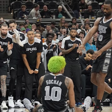 Dec 5, 2024; San Antonio, Texas, USA; San Antonio Spurs bench players react after forward Jeremy Sochan (10) was fouled while scoring in the second half against the Chicago Bulls at Frost Bank Center. Mandatory Credit: Scott Wachter-Imagn Images