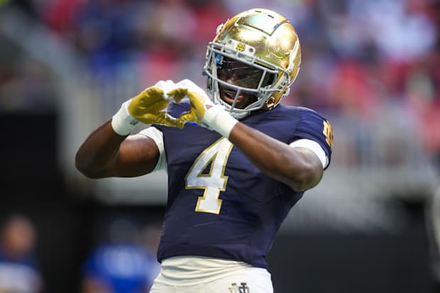 Notre Dame Fighting Irish running back Jeremiyah Love celebrates after a touchdown against the Georgia Tech Yellow Jackets.