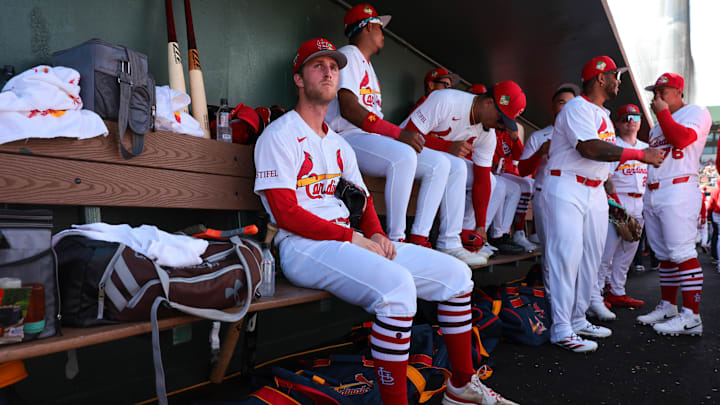 Feb 27, 2026; Jupiter, Florida, USA; St. Louis Cardinals starting pitcher Quinn Mathews (60) sits in the dugout before the game against the New York Mets at Roger Dean Chevrolet Stadium. Mandatory Credit: Sam Navarro-Imagn Images