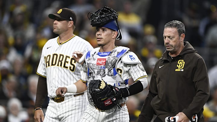 Freddy Fermin leaves the game during the third inning against the Seattle Mariners at Petco Park.