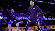 Oct 24, 2025; Los Angeles, California, USA; Los Angeles Lakers guard Luka Doncic (left) and guard Austin Reaves (15) interact before the game against the Minnesota Timberwolves  at Crypto.com Arena.