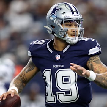 Dallas Cowboys quarterback Trey Lance looks to throw a pass.