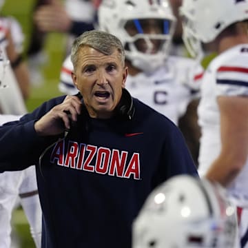 Nov 1, 2025; Boulder, Colorado, USA; Arizona Wildcats head coach Brent Brennan reacts after a touchdown by wide receiver Javin Whatley (6) in the second quarter against the Colorado Buffaloes at Folsom Field. Mandatory Credit: Ron Chenoy-Imagn Images