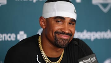 Jul 23, 2025; Philadelphia, PA, USA; Philadelphia Eagles quarterback Jalen Hurts (1) reacts as he addresses media during training camp at NovaCare Complex. Mandatory Credit: Kyle Ross-Imagn Images