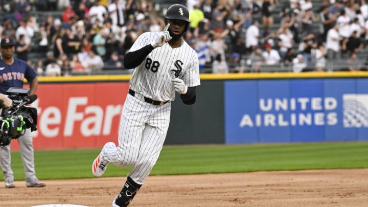 Jun 7, 2024; Chicago, Illinois, USA;  Chicago White Sox outfielder Luis Robert Jr. (88) points after he hits a home run against the Boston Red Sox during the first inning at Guaranteed Rate Field