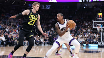 Oct 29, 2024; Salt Lake City, Utah, USA; Sacramento Kings forward DeMar DeRozan (10) steps back to shoot against Utah Jazz forward Lauri Markkanen (23) during the first quarter at Delta Center. Mandatory Credit: Rob Gray-Imagn Images