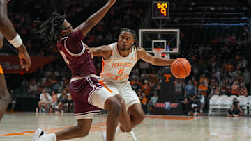 Tennessee guard Chaz Lanier (2) pushes against Montana guard Money Williams (0) during an NCAA basketball game between the Tennessee Volunteers and Montana Grizzlies at Thompson-Boling Arena at Food City Center on Wednesday, Nov. 13, 2024.
