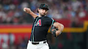 Sep 20, 2025; Phoenix, Arizona, USA; Arizona Diamondbacks pitcher Zac Gallen (23) pitches against the Philadelphia Phillies during the third inning at Chase Field. Mandatory Credit: Joe Camporeale-Imagn Images