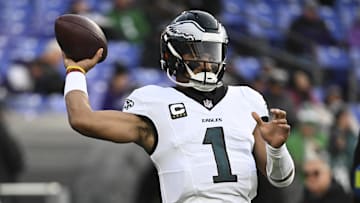 Dec 1, 2024; Baltimore, Maryland, USA;  Philadelphia Eagles quarterback Jalen Hurts (1) throws before the game against the Baltimore Ravens at M&T Bank Stadium. Mandatory Credit: Tommy Gilligan-Imagn Images