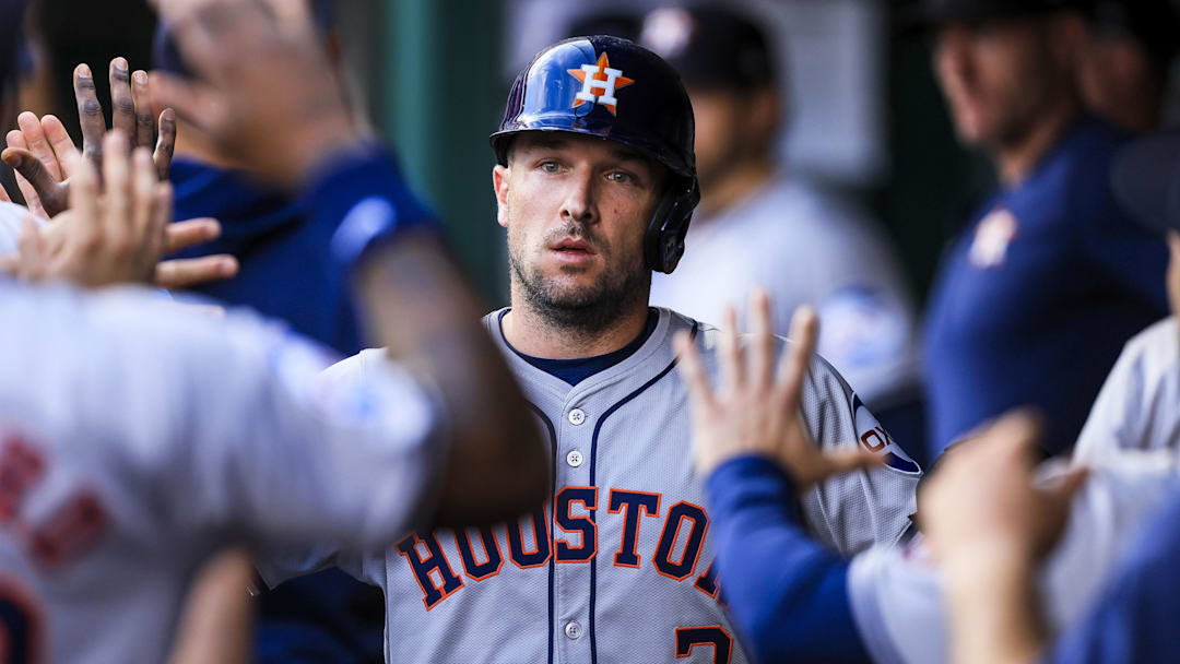 Sep 4, 2024; Cincinnati, Ohio, USA; Houston Astros third baseman Alex Bregman (2) high fives teammates after scoring on a RBI single hit by outfielder Ben Gamel (not pictured) in the second inning against the Cincinnati Reds at Great American Ball Park. Mandatory Credit: Katie Stratman-Imagn Images