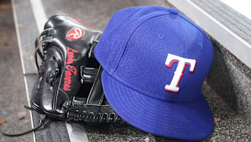 Jul 26, 2024; Toronto, Ontario, CAN; The hat and glove of Texas Rangers fielder Leody Taveras (3) during a game against the Toronto Blue Jays at Rogers Centre.