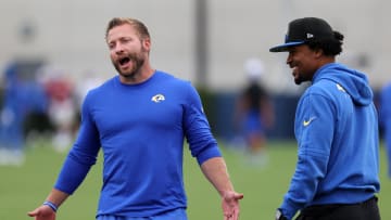 Aug 1, 2024; Los Angeles, CA, USA;  Los Angeles Rams head coach Sean McVay (left) reacts during training camp at Loyola Marymount University. Mandatory Credit: Kiyoshi Mio-USA TODAY Sports