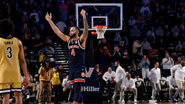 Feb 11, 2025; Nashville, Tennessee, USA; Auburn Tigers forward Johni Broome (4) gestures to the student section after the game against the Vanderbilt Commodores at Memorial Gymnasium. Mandatory Credit: Steve Roberts-Imagn Images