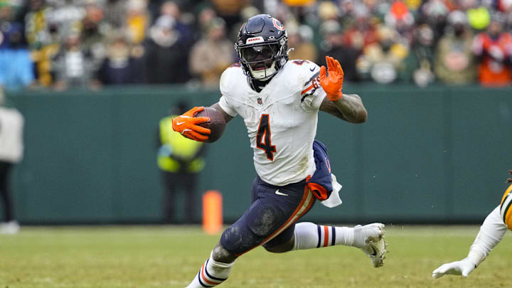 Jan 5, 2025; Green Bay, Wisconsin, USA;  Chicago Bears running back D'Andre Swift (4) during the game against the Green Bay Packers at Lambeau Field. Mandatory Credit: Jeff Hanisch-Imagn Images