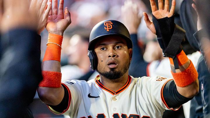 Apr 6, 2026; San Francisco, California, USA; San Francisco Giants infielder Luis Arraez (1) celebrates in the dugout after scoring during the third inning against the Philadelphia Phillies at Oracle Park. Mandatory Credit: Bob Kupbens-Imagn Images