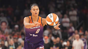 Jun 27, 2025; Phoenix, Arizona, USA; Phoenix Mercury forward Satou Sabally (0) passes the ball against the New York Liberty during the first half at Footprint Center. Mandatory Credit: Joe Camporeale-Imagn Images
