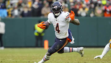 Jan 5, 2025; Green Bay, Wisconsin, USA;  Chicago Bears running back D'Andre Swift (4) during the game against the Green Bay Packers at Lambeau Field. Mandatory Credit: Jeff Hanisch-Imagn Images