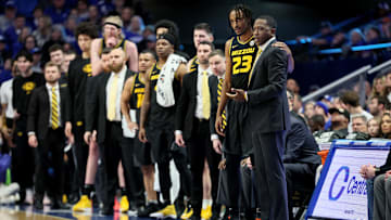 Missouri Head Coach Dennis Gates talks to his players as he prepares to sub them in, in a game last season.
