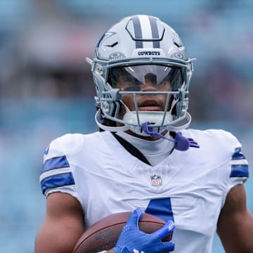 Dallas Cowboys wide receiver Jalen Tolbert warms up before the game against the Carolina Panthers at Bank of America Stadium. 