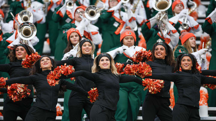 Dec 28, 2023; Bronx, NY, USA;  Miami Hurricanes cheer squad and band perform during the first half of the 2023 Pinstripe Bowl against the Rutgers Scarlet Knights at Yankee Stadium. Mandatory Credit: Vincent Carchietta-USA TODAY Sports