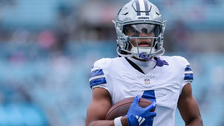 Oct 12, 2025; Charlotte, North Carolina, USA; Dallas Cowboys wide receiver Jalen Tolbert (1) warms up before the game against the Carolina Panthers at Bank of America Stadium.