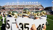 Nov 1, 2025; Chestnut Hill, Massachusetts, USA; Notre Dame Fighting Irish players players huddle before the game against the Boston College Eagles at Alumni Stadium. 