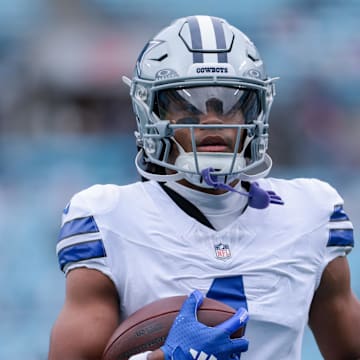 Dallas Cowboys wide receiver Jalen Tolbert warms up before the game against the Carolina Panthers at Bank of America Stadium.
