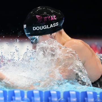 Kate Douglass competes in the 200-meter breaststroke semifinals Wednesday, June 19, 2024, during the fifth day of competition for the U.S. Olympic Team Swimming Trials at Lucas Oil Stadium in Indianapolis.