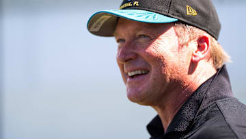 Former NFL Coach Jon Gruden have a laugh while attending an NFL training camp session ten at the Miller Electric Center, Tuesday, Aug. 5, 2025, in Jacksonville, Fla. [Doug Engle/Florida Times-Union]