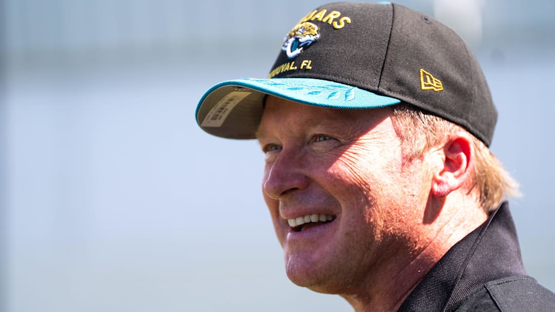 Former NFL Coach Jon Gruden have a laugh while attending an NFL training camp session ten at the Miller Electric Center, Tuesday, Aug. 5, 2025, in Jacksonville, Fla. [Doug Engle/Florida Times-Union]