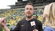 Sep 23, 2023; Eugene, Oregon, USA; ESPN reporter Katie George interviews Oregon Ducks head coach Dan Lanning after the game at Autzen Stadium. Mandatory Credit: Soobum Im-Imagn Images