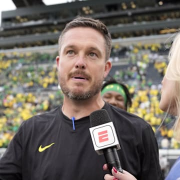 Sep 23, 2023; Eugene, Oregon, USA; ESPN reporter Katie George interviews Oregon Ducks head coach Dan Lanning after the game at Autzen Stadium. Mandatory Credit: Soobum Im-Imagn Images