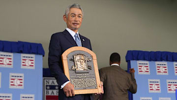 Jul 27, 2025; Cooperstown, NY, USA; Hall of Fame inductee Ichiro Suzuki poses with his Hall of Fame plaque after the Baseball Hall of Fame Induction Ceremony at the Clark Sports Center. Mandatory Credit: Gregory Fisher-Imagn Images