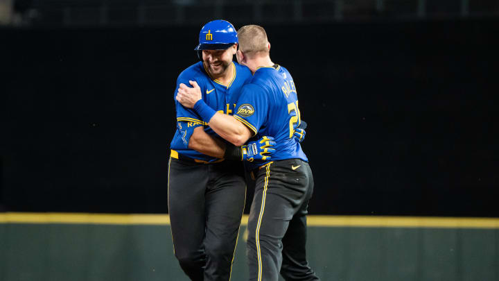 Seattle Mariners Cal Raleigh (29), left, and Luke Raley (20) celebrate after a game against the Minnesota Twins at T-Mobile Park on June 28.