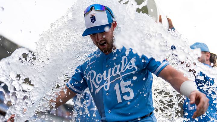 Jul 18, 2026: Kansas City Royals center fielder Lane Thomas (15) is doused with water by left fielder Isaac Collins (1) and catcher Carter Jensen (22) after defeating the San Diego Padres at Kauffman Stadium. Credit: Jay Biggerstaff-Imagn Images
