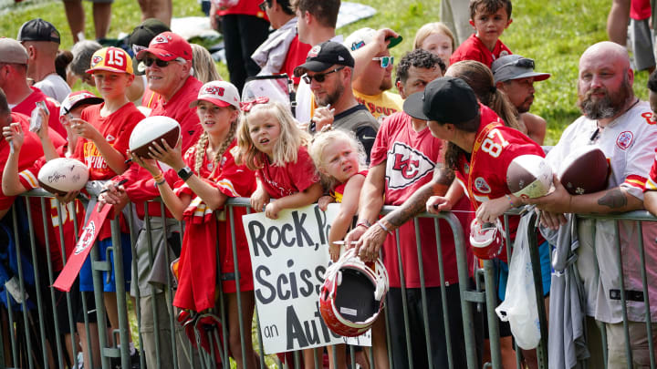 Jul 24, 2023; St. Joseph, MO, USA; Kansas City Chiefs fans line the fence hoping for autographs after training camp at Missouri Western State University. Mandatory Credit: Denny Medley-USA TODAY Sports