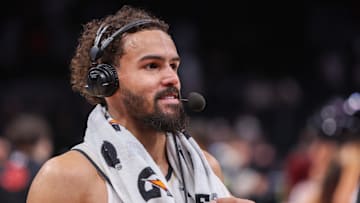 Feb 7, 2025; Atlanta, Georgia, USA; Atlanta Hawks guard Trae Young (11) does an interview after a victory against the Milwaukee Bucks in the fourth quarter at State Farm Arena. Mandatory Credit: Brett Davis-Imagn Images
