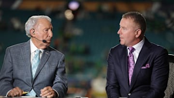 Jan 9, 2025; Miami, FL, USA; ESPN analysts Lee Corso and Kirk Herbstreit before the game between the Notre Dame Fighting Irish and the Penn State Nittany Lions in the Orange Bowl at Hard Rock Stadium. Mandatory Credit: Nathan Ray Seebeck-Imagn Images