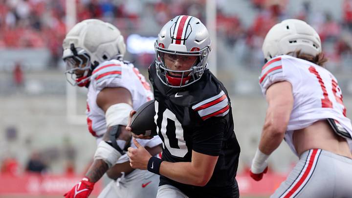 Apr 18, 2026; Columbus, OH, USA;  Ohio State Quarterback Julian Sayin (10) runs the ball for a touchdown during the annual spring game at Ohio Stadium. Mandatory Credit: Joseph Maiorana-Imagn Images 